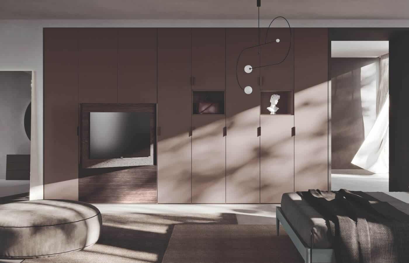 L'armadio ad anta battente Dionisio visto frontalmente all'interno di una camera da letto